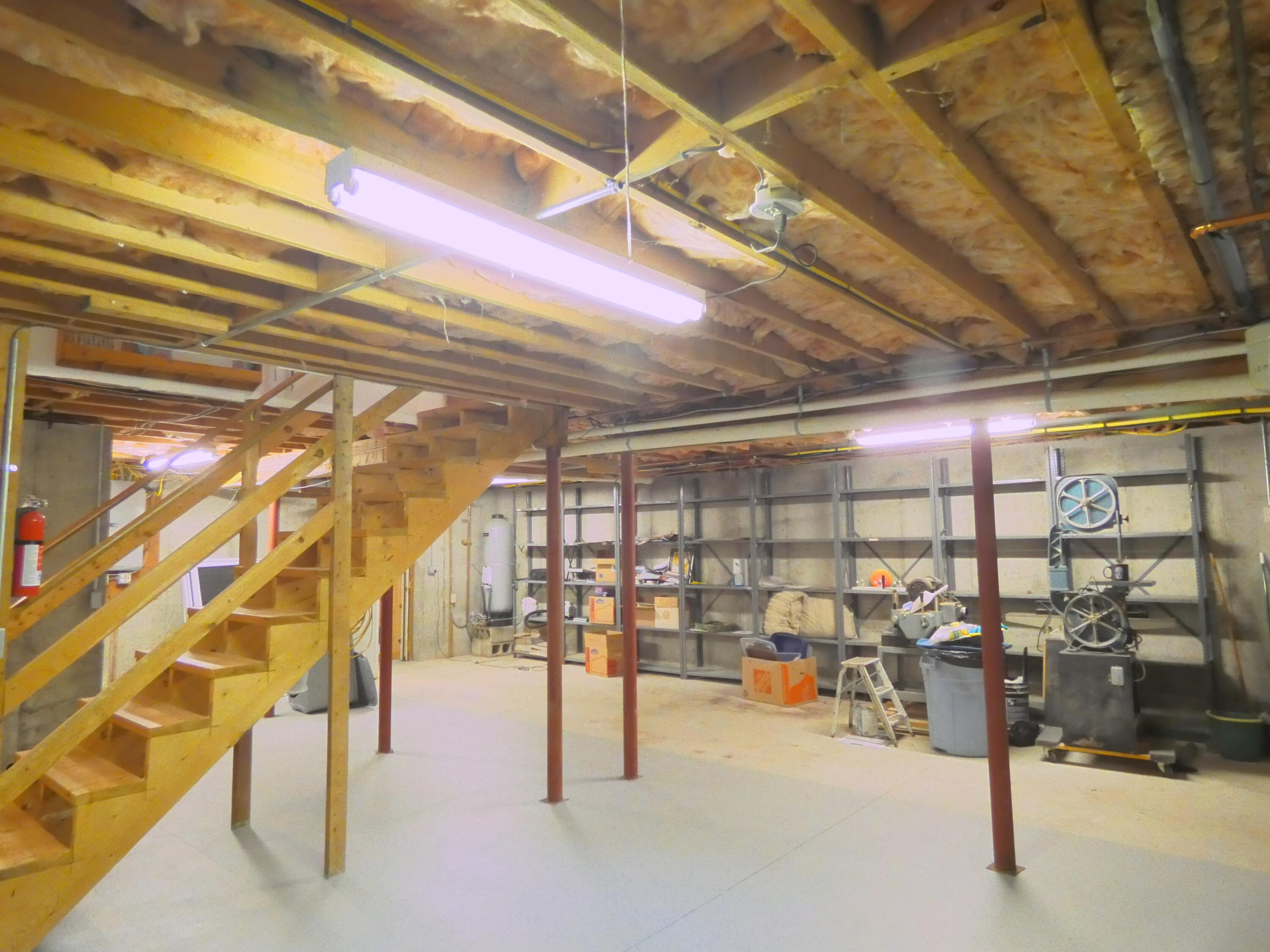 565 Sampsons Mill Road Cotuit, MA 02635 - Photo 69 of 87 a view of a garage with wooden floor