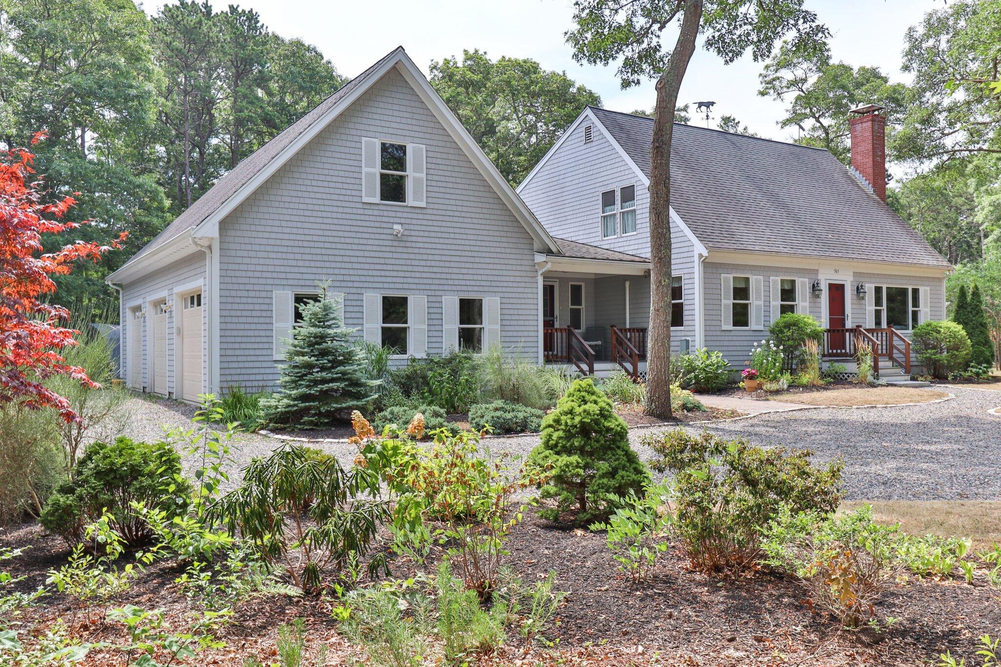 565 Sampsons Mill Road Cotuit, MA 02635 - Photo 73 of 87 a front view of house with yard and green space