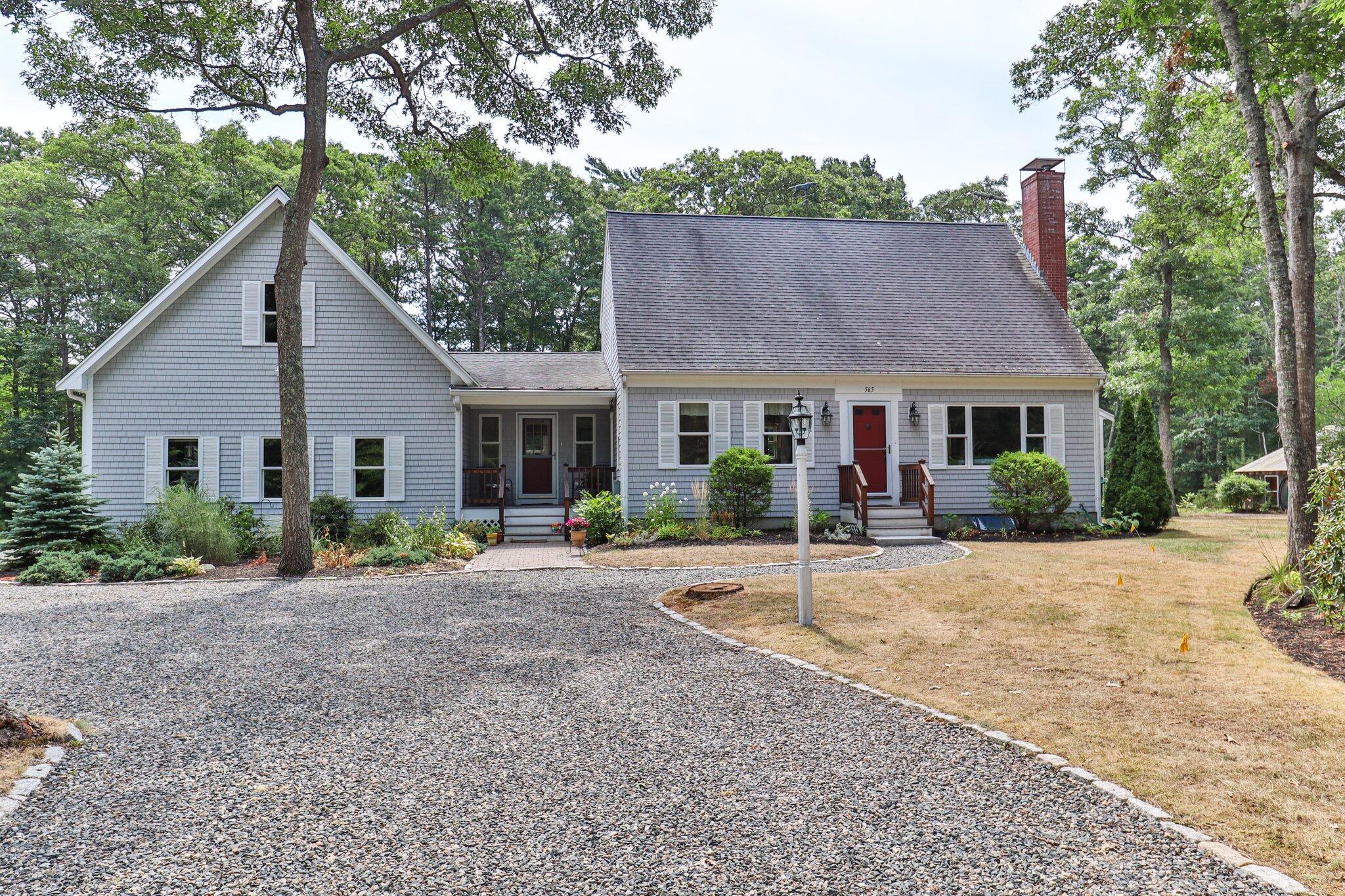 565 Sampsons Mill Road Cotuit, MA 02635 - Photo 82 of 87 a view of a house with a yard plants and large tree