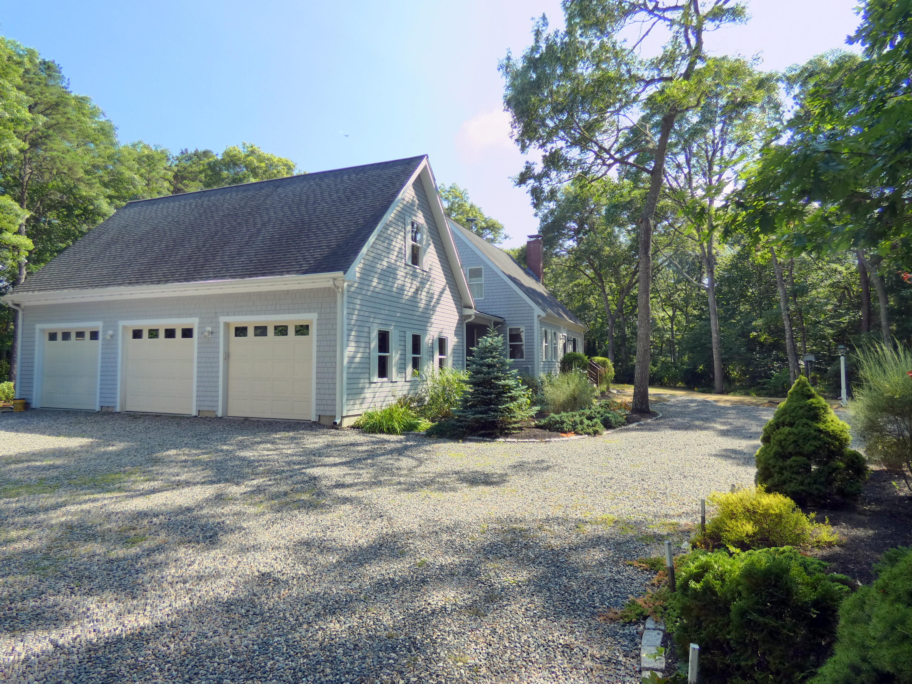565 Sampsons Mill Road Cotuit, MA 02635 - Photo 83 of 87 a view of a house with a outdoor space