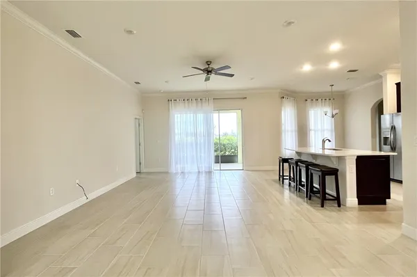 a view of a kitchen and dining room