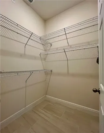 a view of a room with racks on the wall