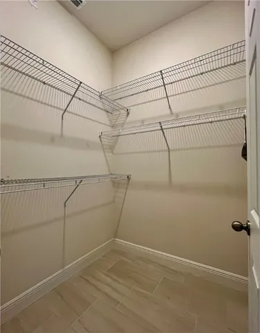 a view of a room with racks on the wall