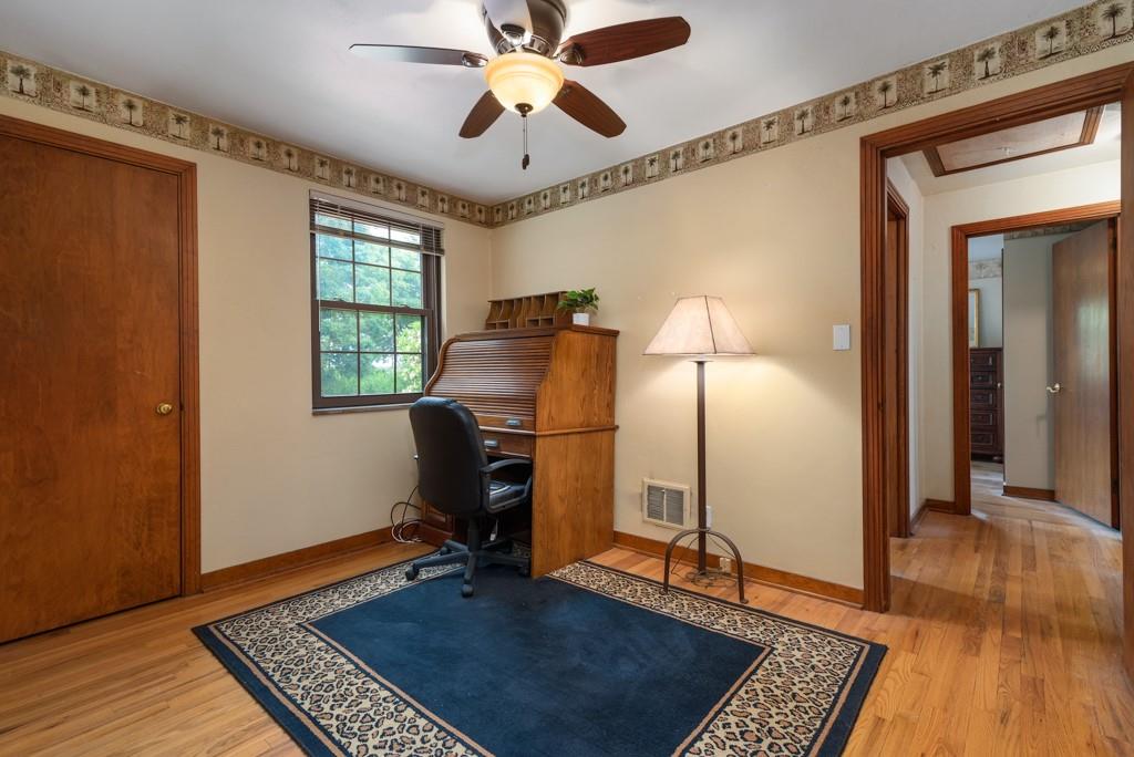 8125 Peebles Road Pittsburgh, PA 15237 - Photo 12 of 22 a view of a workspace with furniture and a window