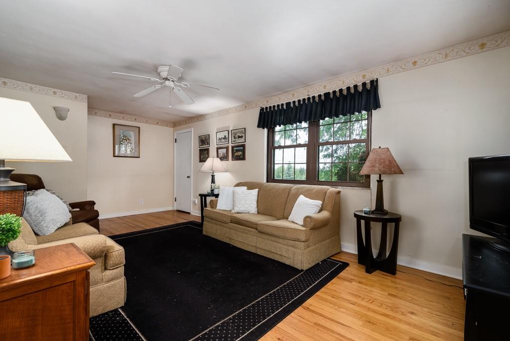 8125 Peebles Road Pittsburgh, PA 15237 - Photo 3 of 22 a living room with furniture fireplace and a window
