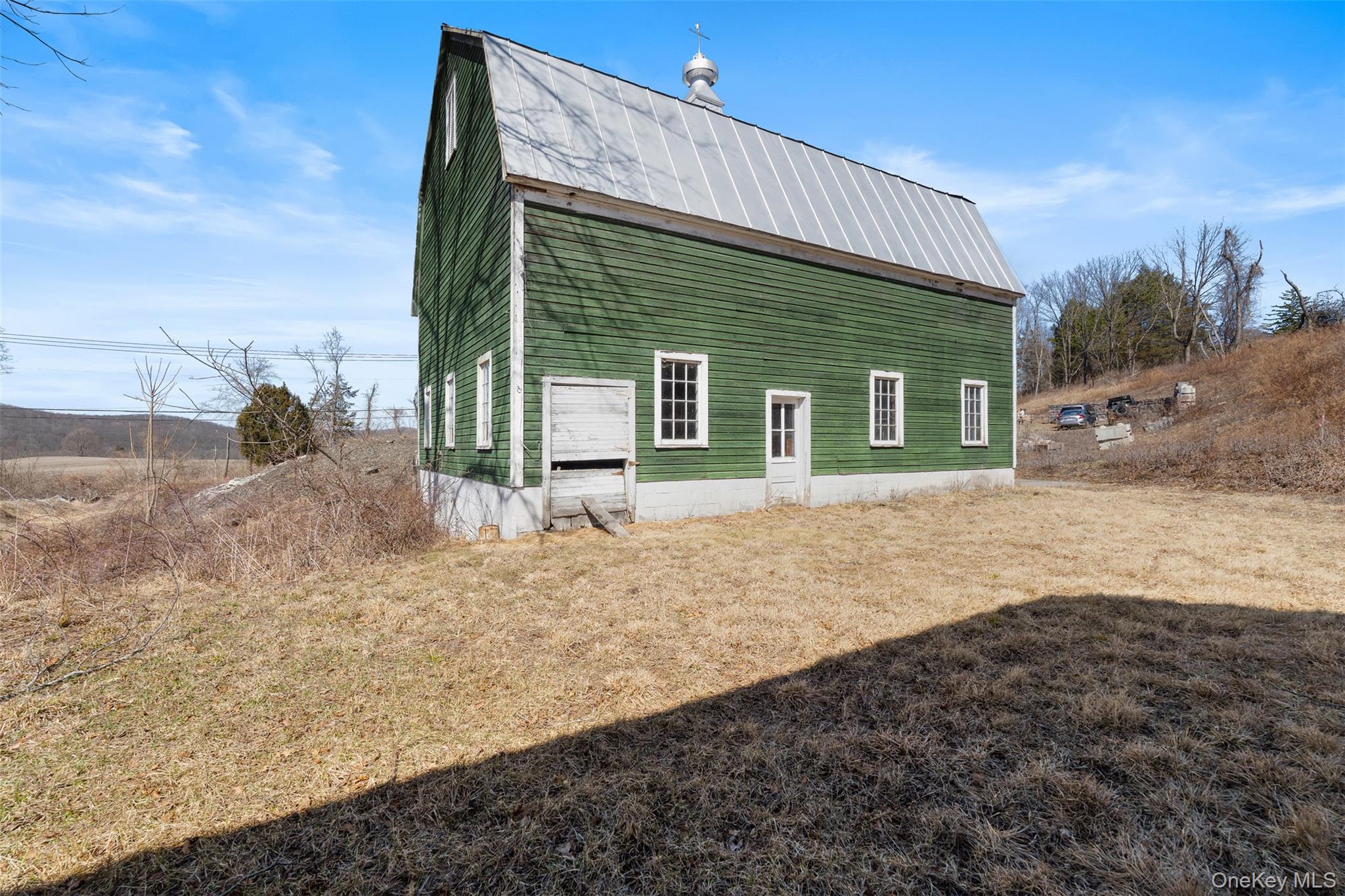 70 Barmore Road LaGrangeville, NY 12540 - Photo 40 of 47 View of property exterior with a metal roof