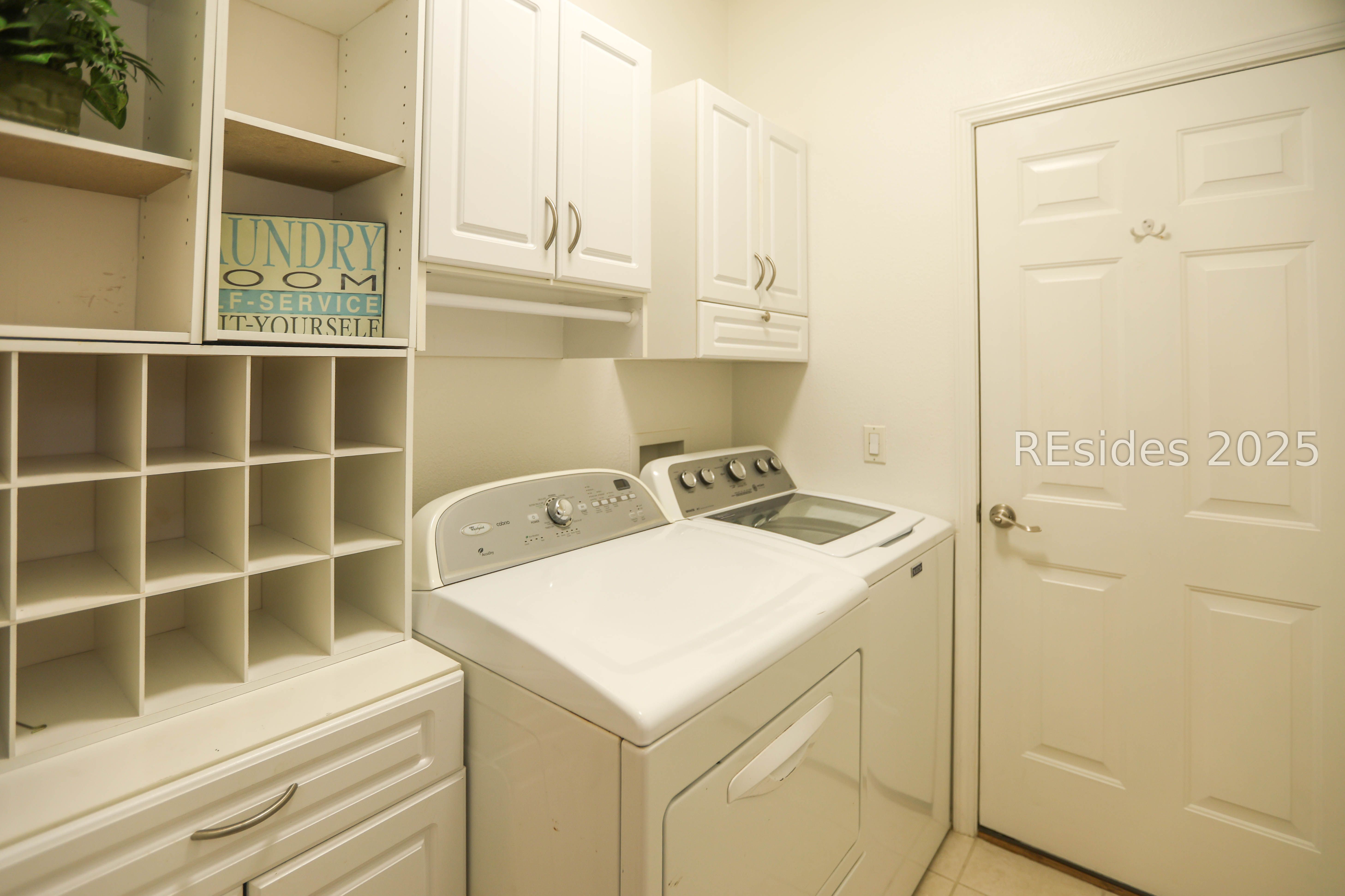 14 Andover Place Bluffton, SC 29909 - Photo 35 of 64 Laundry room has extra storage cabinets