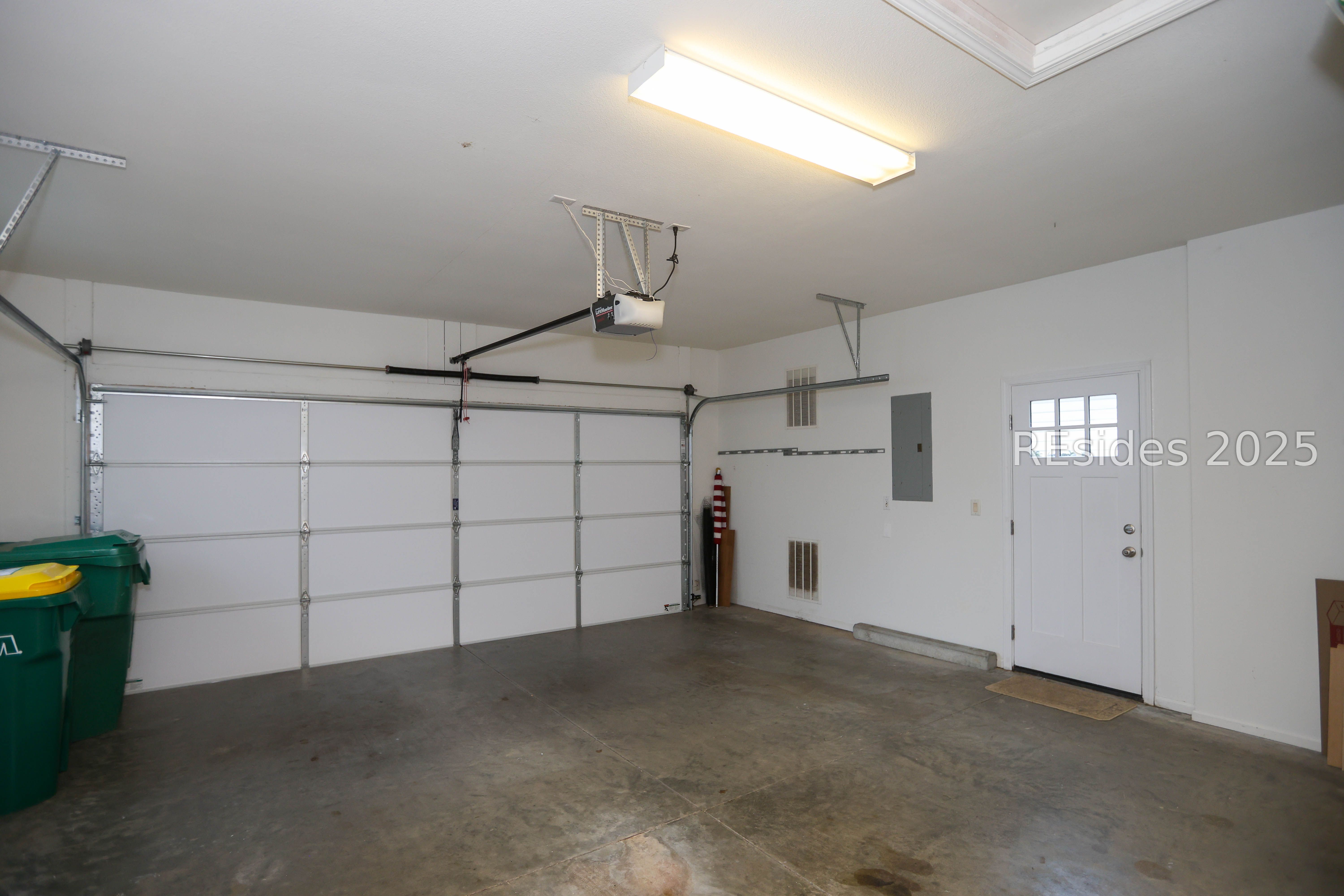 14 Andover Place Bluffton, SC 29909 - Photo 37 of 64 Newer Garage door & Service door to outside.