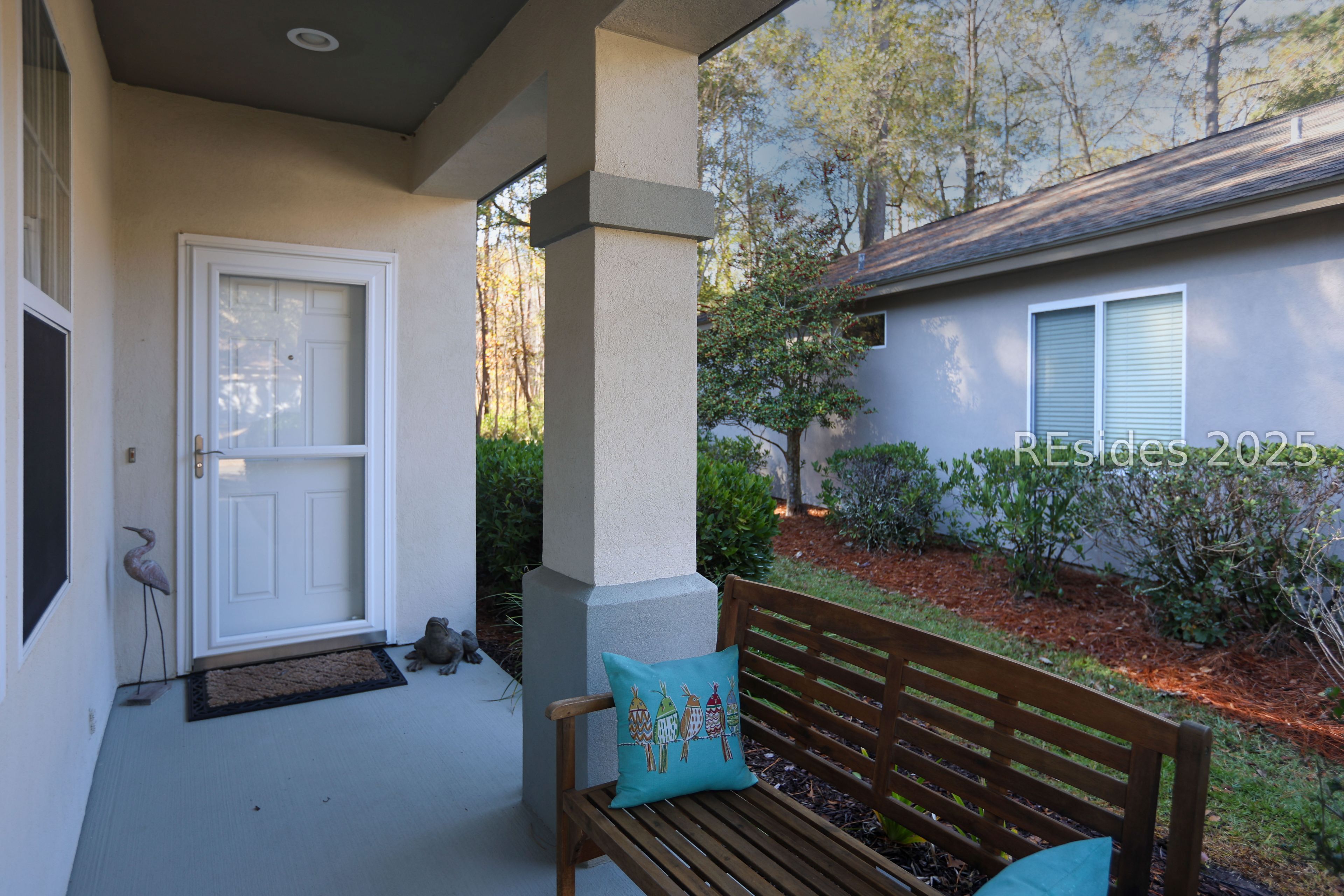 14 Andover Place Bluffton, SC 29909 - Photo 7 of 64 Welcome friends on the porch!