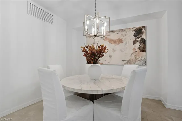 a vase of flowers sitting on a table