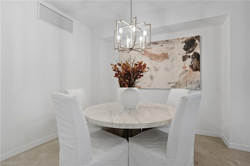 5667 Melbourne Court, Unit 7812 Ave Maria, FL 34142 - Photo 15 of 49 a vase of flowers sitting on a table