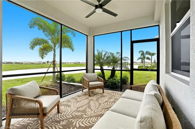 a balcony with view of outdoor space