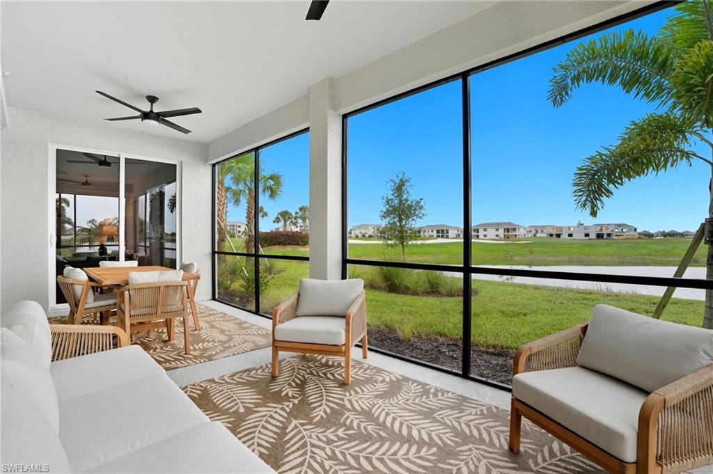 5667 Melbourne Court, Unit 7812 Ave Maria, FL 34142 - Photo 34 of 49 a outdoor living space with furniture and a garden