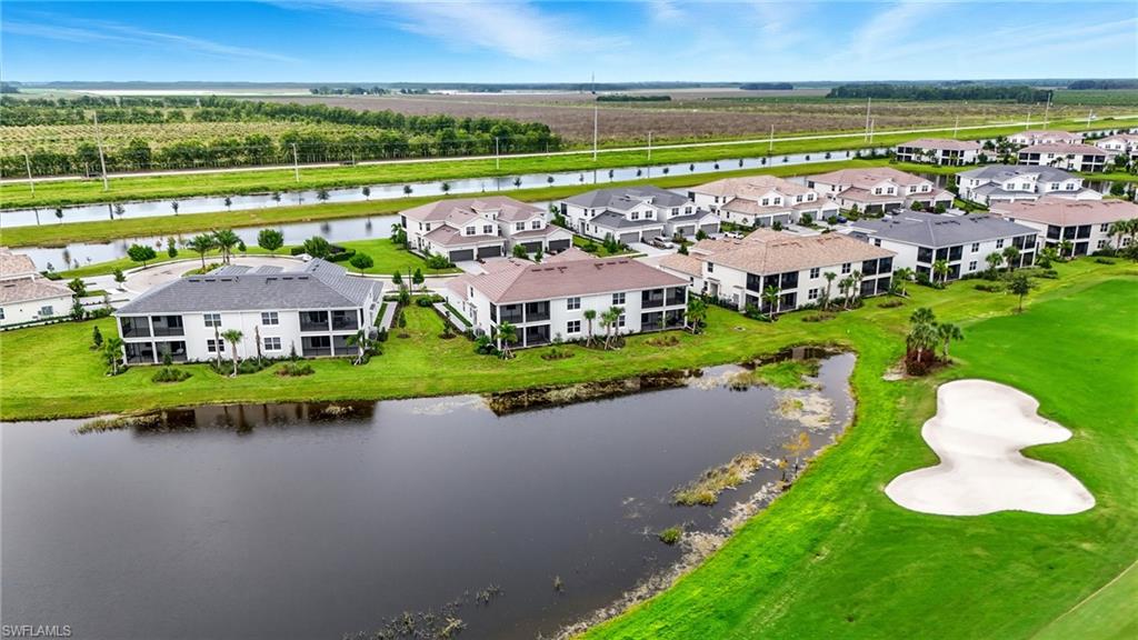 5667 Melbourne Court, Unit 7812 Ave Maria, FL 34142 - Photo 40 of 49 an aerial view of a house with a garden