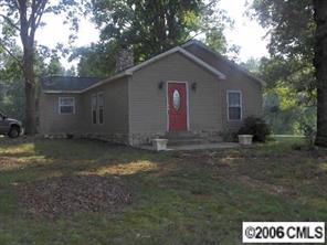 3907 Plyler Mill Road Monroe, NC 28112 - Photo 1 of 8 a house view with backyard space