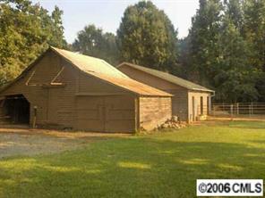 3907 Plyler Mill Road Monroe, NC 28112 - Photo 4 of 8 a front view of house with yard and trees