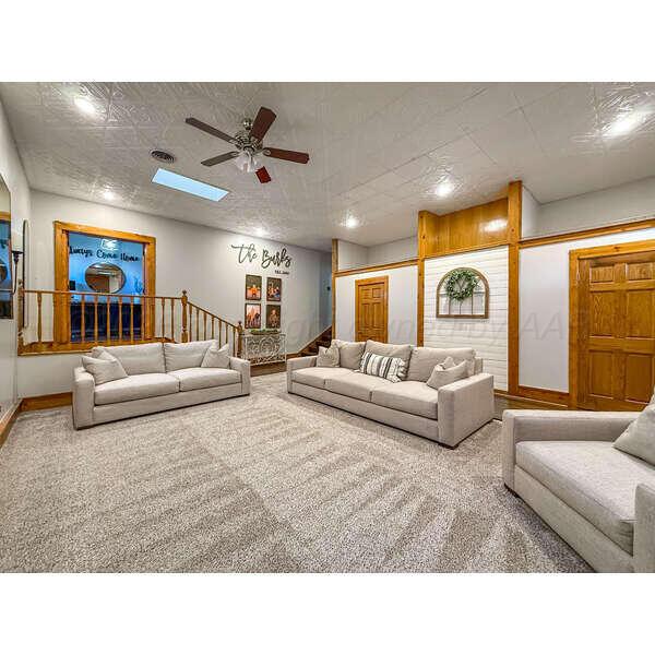 933 Elmore Street Borger, TX 79007 - Photo 11 of 53 a living room with furniture and a large window