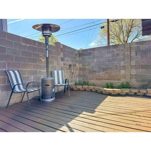 933 Elmore Street Borger, TX 79007 - Photo 42 of 53 a view of a patio with a table and chairs