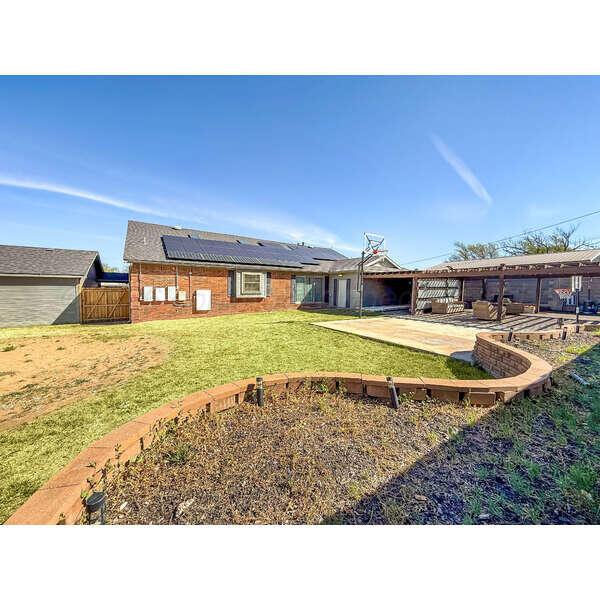 933 Elmore Street Borger, TX 79007 - Photo 48 of 53 a view of a house with swimming pool