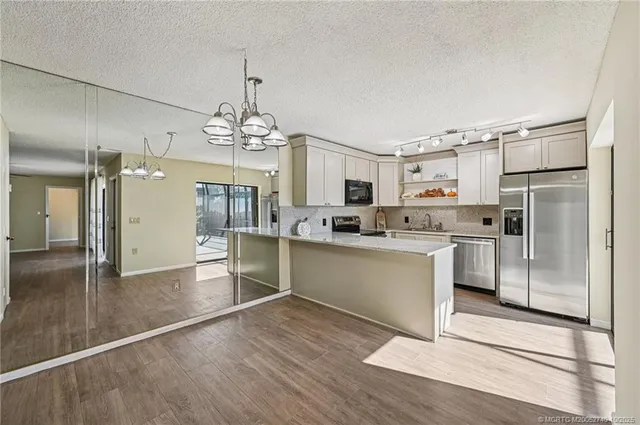 $300,000 | 6466 Southeast Windsong Lane, Stuart, FL 34997