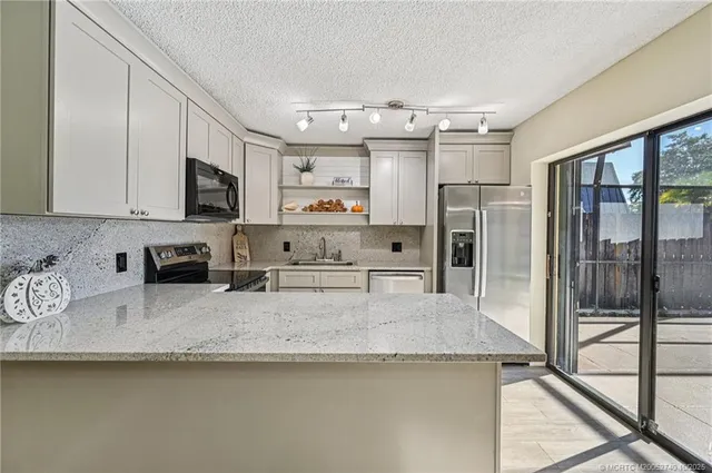 $300,000 | 6466 Southeast Windsong Lane, Stuart, FL 34997