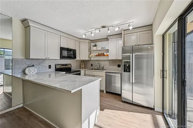 $300,000 | 6466 Southeast Windsong Lane, Stuart, FL 34997