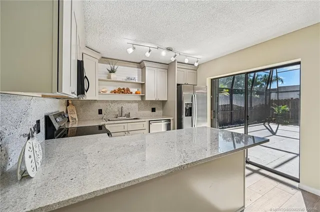 $300,000 | 6466 Southeast Windsong Lane, Stuart, FL 34997