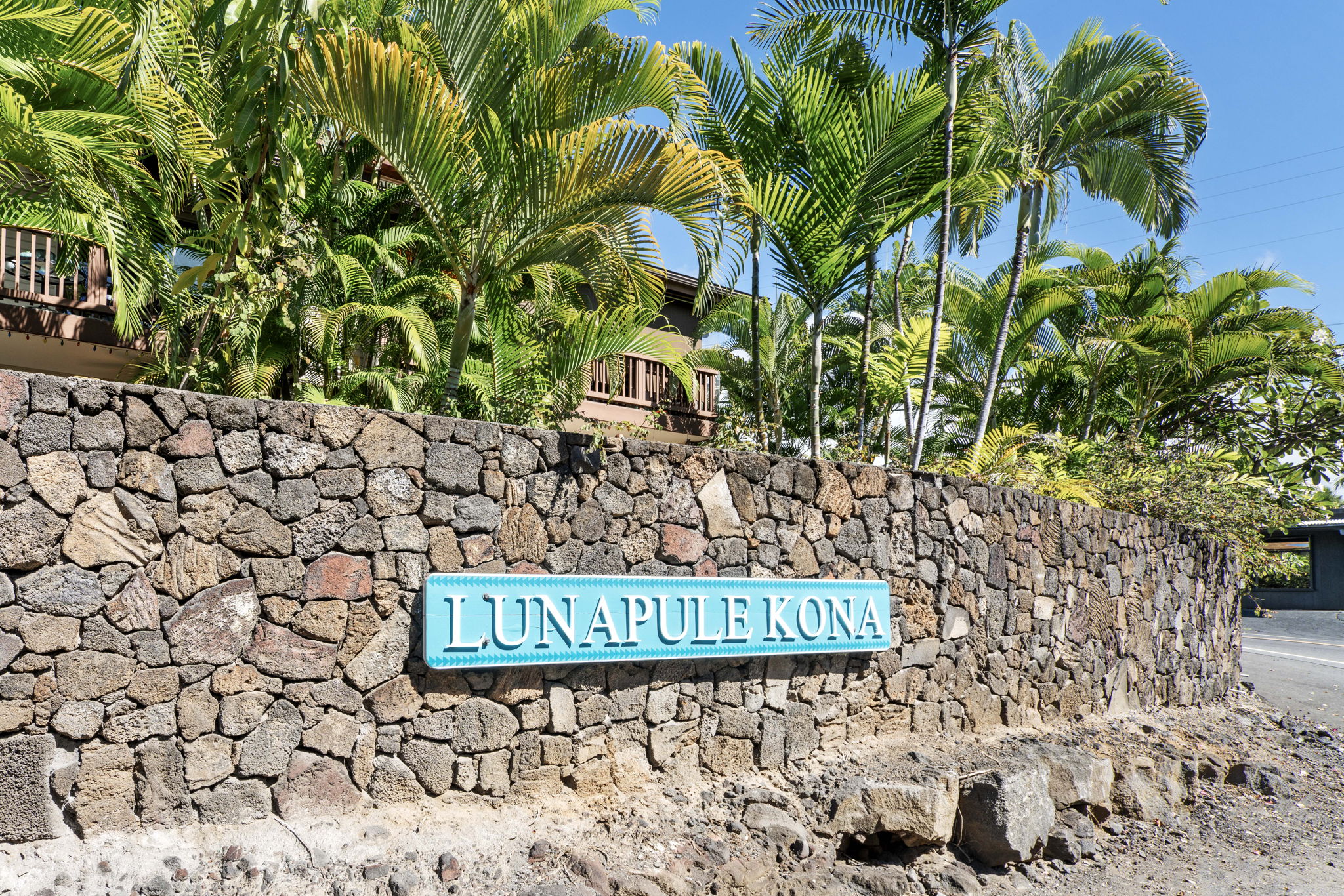 75-123 Lunapule Road, Unit 107 Kailua-Kona, HI 96740 - Photo 17 of 17 a sign that is on the side of the road