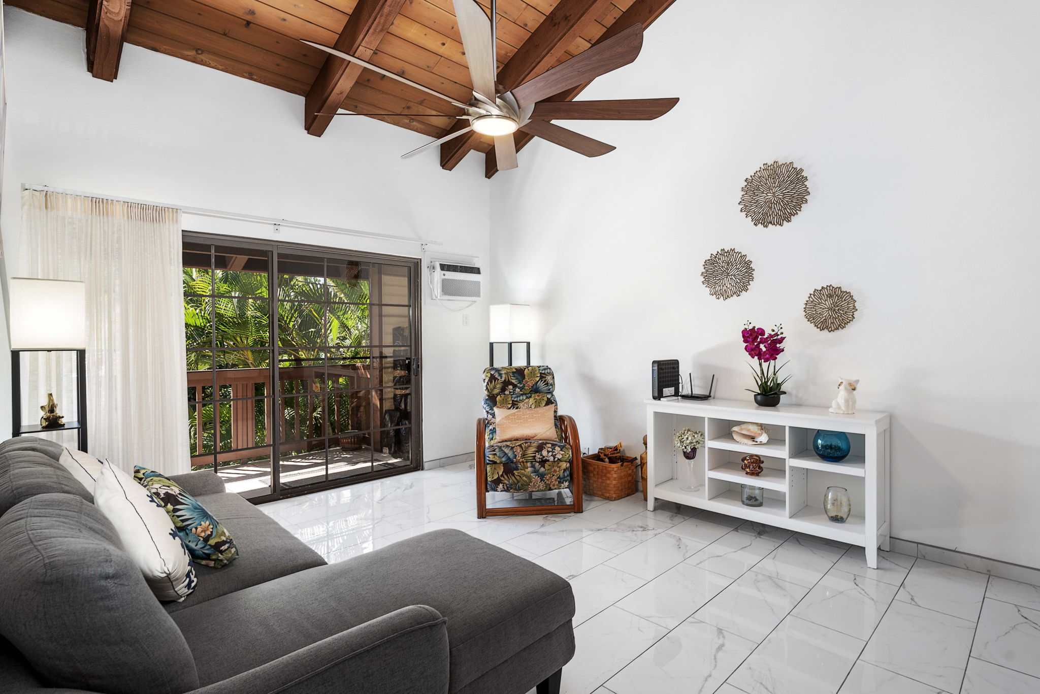 75-123 Lunapule Road, Unit 107 Kailua-Kona, HI 96740 - Photo 3 of 17 a living room with furniture and a window
