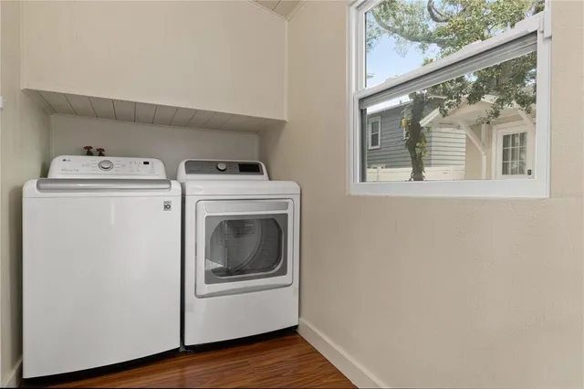 a utility room with dryer and washer