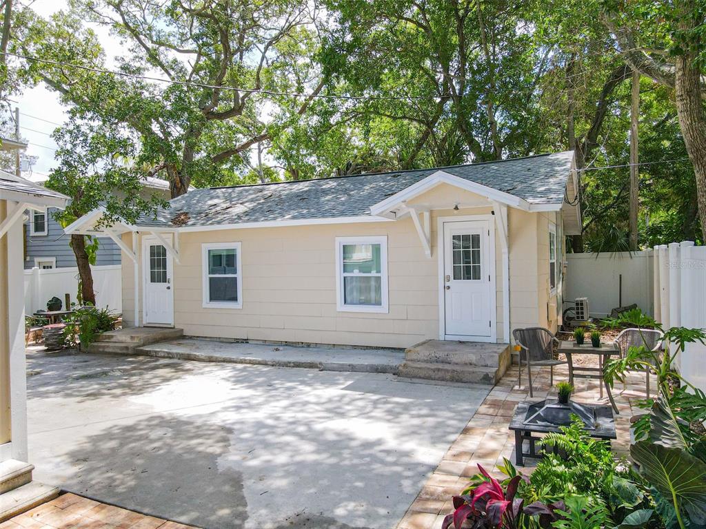 609 North Osceola Avenue Clearwater, FL 33755 - Photo 26 of 47 a front view of a house with garden