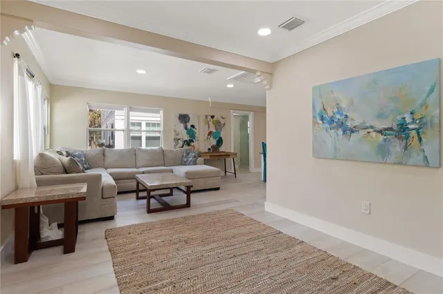 a living room with furniture and a couch