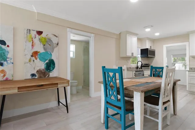 a view of a dining room with furniture