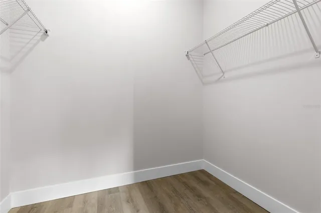 a view of a room with racks on the wall