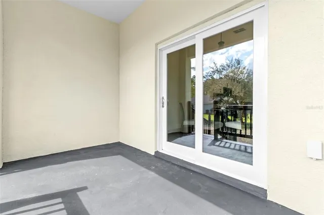 a view of a room with a large window