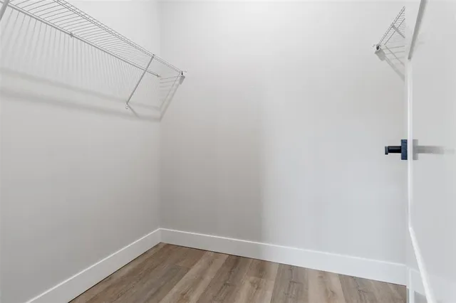 a view of a room with racks on the wall