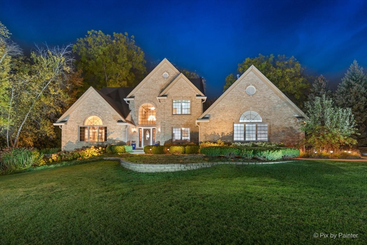 7203 Edgewood Court Spring Grove, IL 60081 - Photo 1 of 46 a view of house with garden