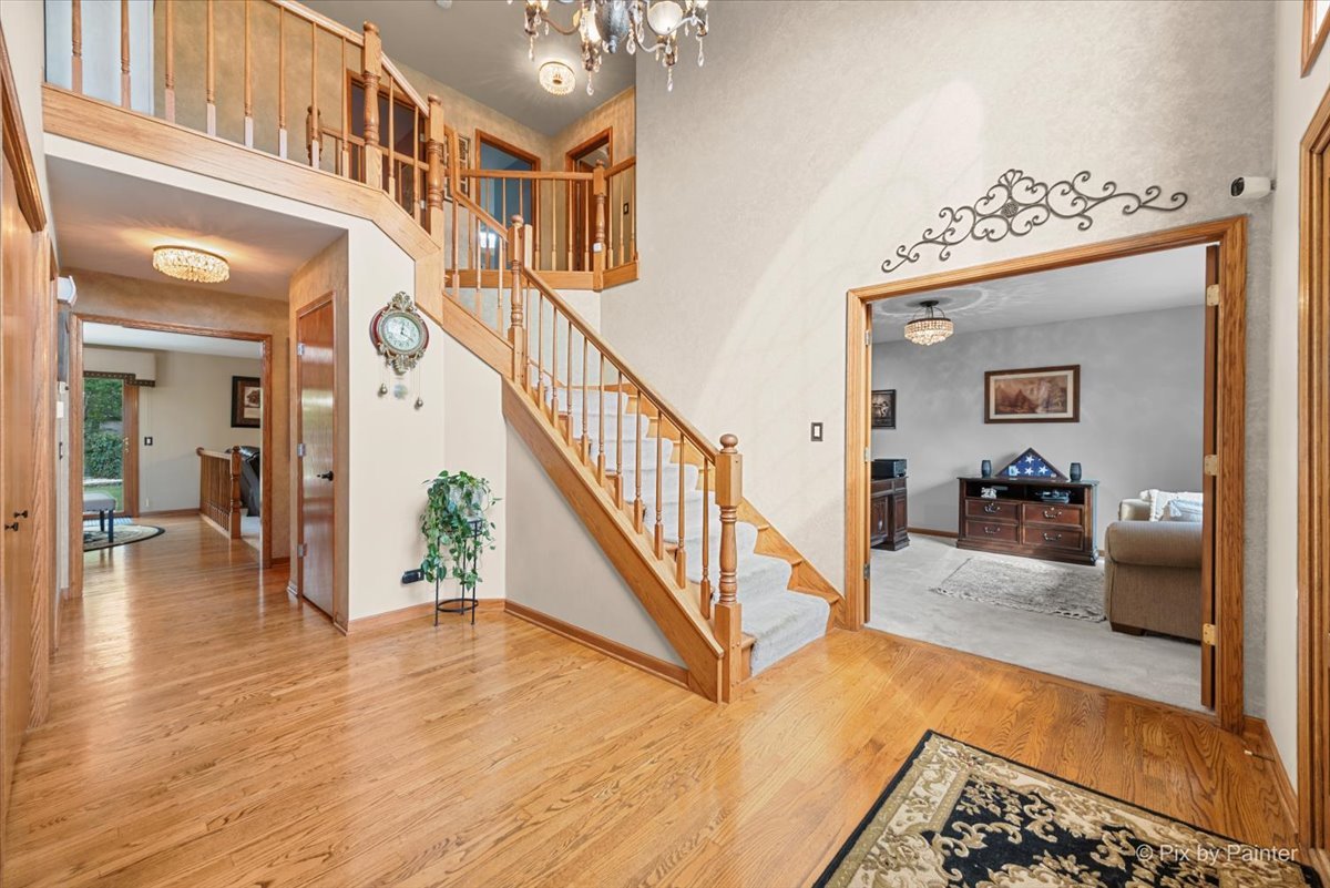 7203 Edgewood Court Spring Grove, IL 60081 - Photo 19 of 46 a view of an entryway and livingroom with furniture