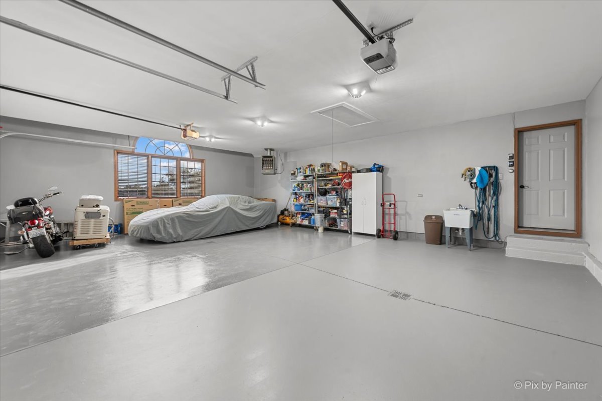 7203 Edgewood Court Spring Grove, IL 60081 - Photo 32 of 46 a view of parking garage with cars