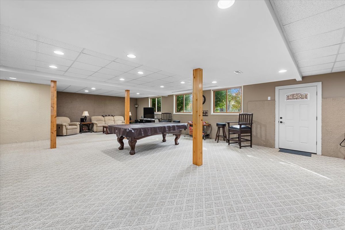 7203 Edgewood Court Spring Grove, IL 60081 - Photo 36 of 46 a living room with furniture and a table