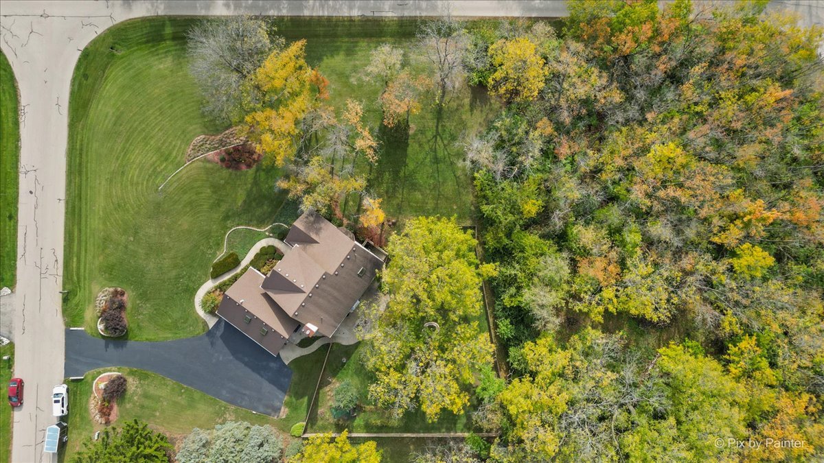 7203 Edgewood Court Spring Grove, IL 60081 - Photo 41 of 46 an aerial view of a house with a yard