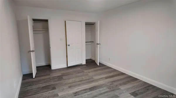 a street view with tall buildings