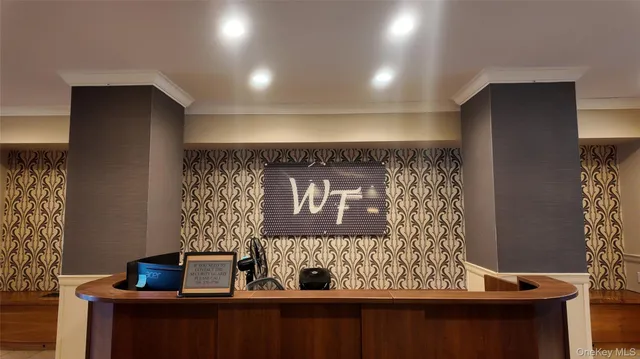 a view of an empty room with windows