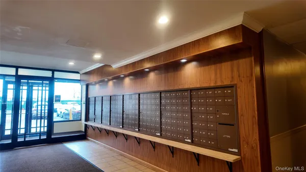 a view of an empty room with a fireplace