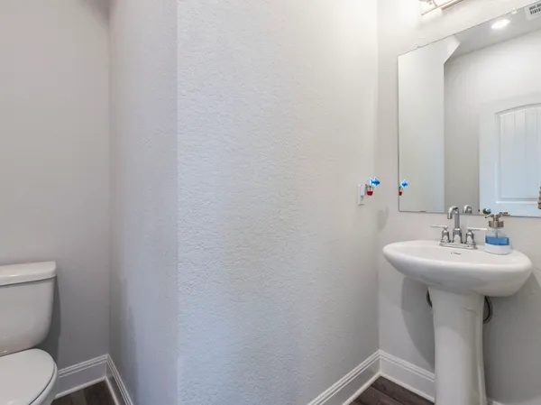 a bathroom with a tub and shower