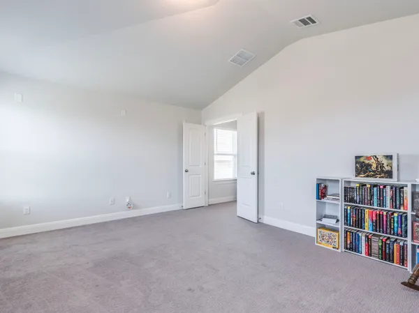 a workspace with furniture and a window