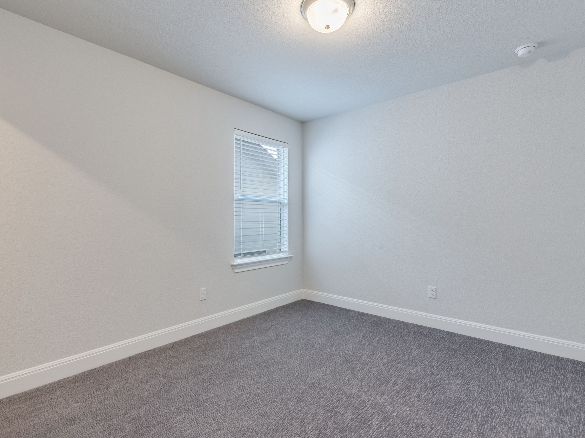 142 Mount Locke Road Dripping Springs, TX 78620 - Photo 21 of 31 an empty room with a window