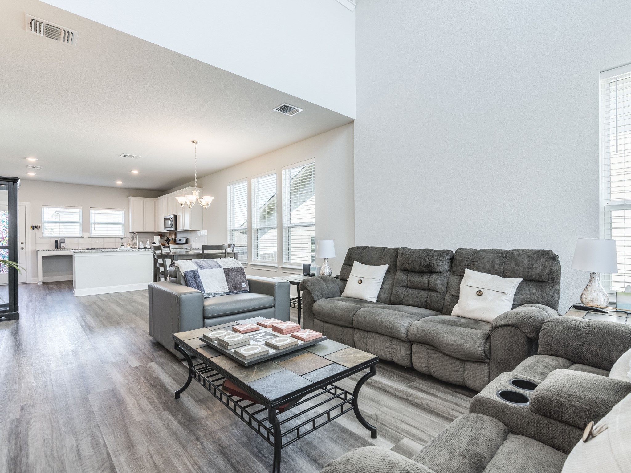 142 Mount Locke Road Dripping Springs, TX 78620 - Photo 29 of 31 a living room with furniture and kitchen view