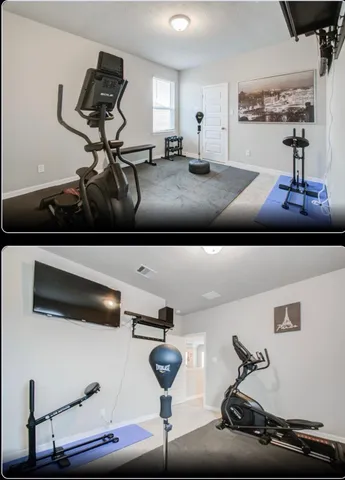 a living room with furniture and a mirror