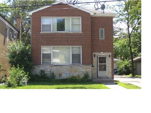 1126 NORTHWEST Hwy Park Ridge Park Ridge, IL 60068 - Photo 1 of 1 a front view of a house with a garden